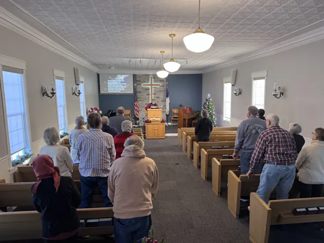The congregation gathered in the sanctuary during a Sunday service